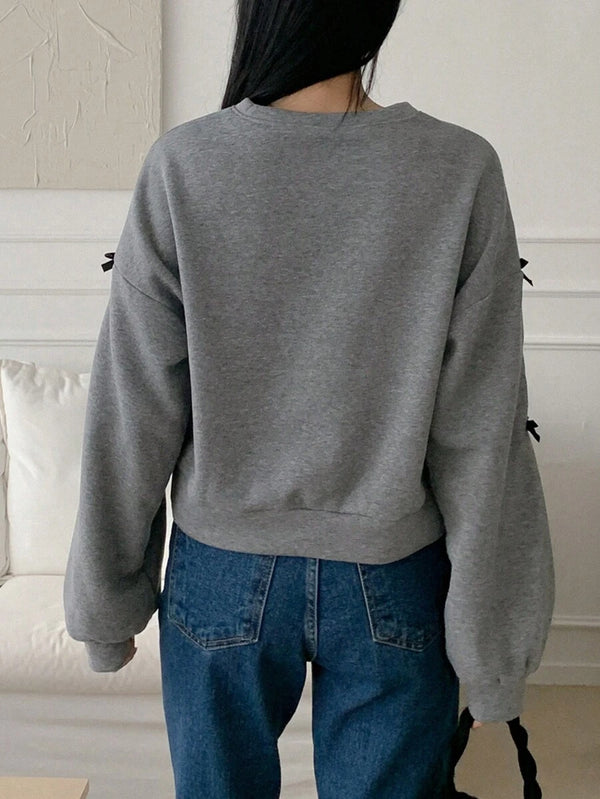 Bow Loose Fit Crew Neck